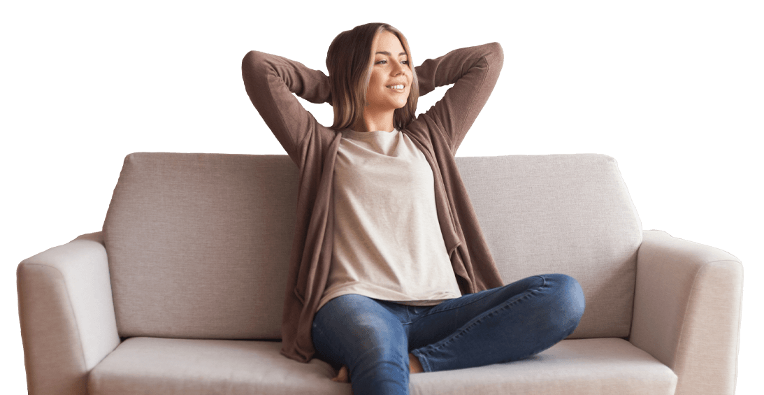 A woman leans back with her hands behind her head and relaxes after adding Extra Time to her Momentum checking account.