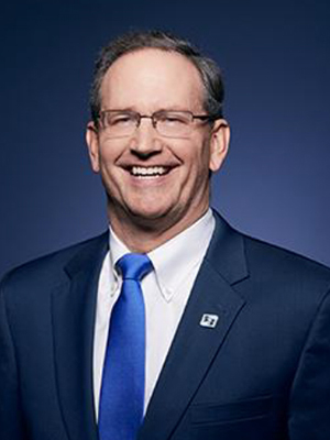 A headshot photo of Craig Wolf, SVP, Group Head - Consumer & Retail