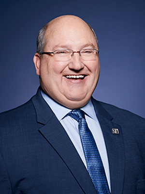 A headshot photo of Richard Butler, SVP, Group Head Energy