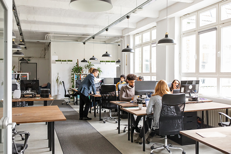 Modern tech office space with coworkers