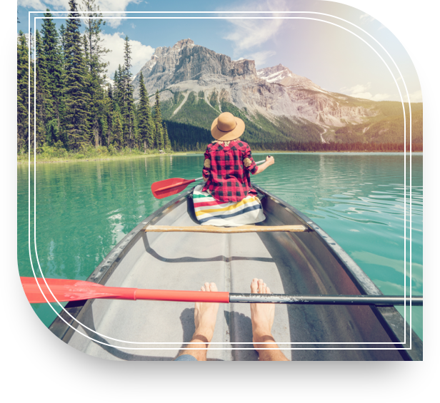 Retired couple relaxing in a boat after discussing investment solutions with their wealth management professional at Fifth Third.