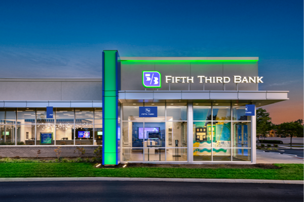 Fifth Third Bank branch exterior glowing at sunset