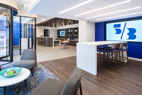 Fifth Third Bank branch lobby with accessible seating and digital screens