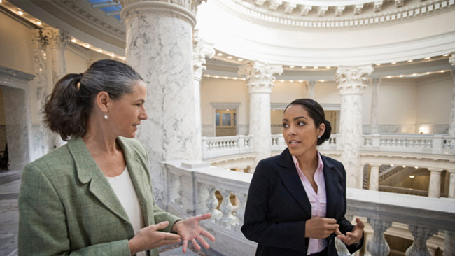 Two business women discussing