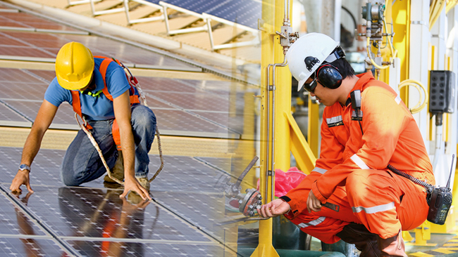 Engineers working on solar panels and energy equipment