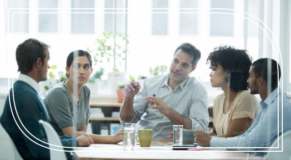 Team of financial professionals discussing an estate plan.